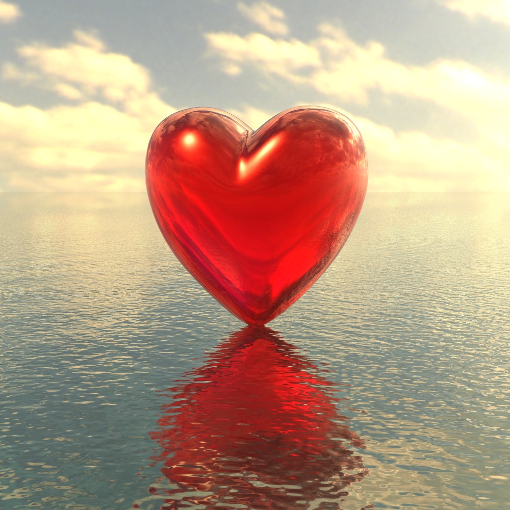 Red love heart on a water background