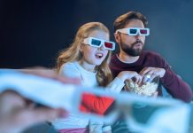 Father and daughter in 3d glasses