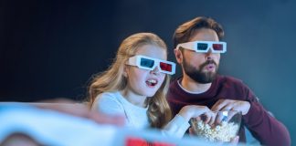 Father and daughter in 3d glasses