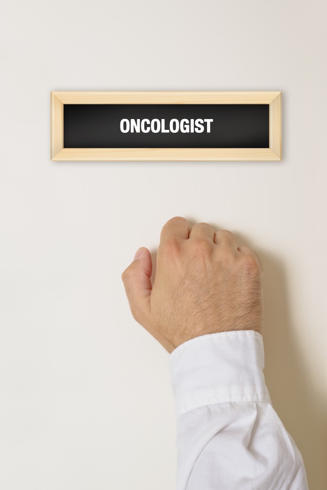 Male patient knocking on Oncologist door