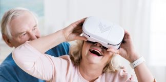 Couple with virtual reality headset